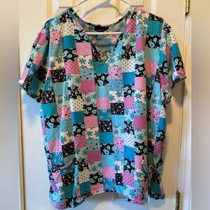 Cherokee scrub top Size XL. PLEASE SEE PHOTOS.